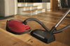 Miele Complete C3 HomeCare+ SEB236 PowerLine - SGPE0 - 10014750 – red canister and floor head in a living room