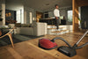 Miele Complete C3 HomeCare+ SEB236 PowerLine - SGPE0 - 10014750 – red canister and floor head in a living room