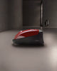 Miele HomeCare Classic C1 Pure Suction PowerLine - SBCN0 - 11262170 – red canister body on hard floor, side view