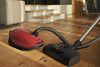 Miele Complete C3 HomeCare Electro+ SEB 228 - 11850030 – red canister and floor head in a living room