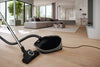Miele Guard M1 Cat & Dog Canister Vacuum -12704670 – canister and floor head in living room