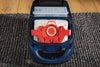 Miele FJM AirClean XL Pack, 8 Bags + HA50 HEPA Filter — dust bag and filter installed in a canister vacuum