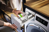 Miele WA COU 0603 L Outdoor capsules — placing a capsule in the detergent drawer