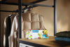 Miele WA COU 0603 L Outdoor capsules — capsule packaging beside outdoor clothing