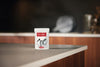 Miele GP CL WG 2001 P IntenseClean 7 oz (200 g) appliance cleaner — cleaner container on a kitchen countertop
