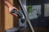Miele HX-AH 20 Duoflex accessory holder — placing an attachment in the wand-mounted holder