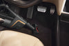 Miele HX-EC 10 Compact handheld brush — cleaning a car footwell