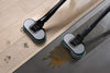 Miele HX-APU AquaPads Universal cleaning cloth — AquaTwister cleaning footprints and a spill