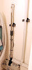Wand Wall Clamp mounted on a wall for storing a central vacuum wand
