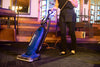 Powr-Flite Solar Reach Upright Vacuum – Part# PV090-W12-U – operator vacuuming venue carpet