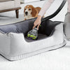 BISSELL Pet TurboEraser Tool 1614936 with White Bristles angled view cleaning a pet bed