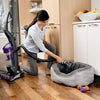 BISSELL Pet TurboEraser Tool 1604116 side view in use cleaning a pet bed