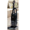 Riccar Deluxe Cordless Upright Vacuum - R27CV – person using upright vacuum on rug