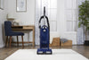 Riccar Tandem Air Deluxe Upright Vacuum - R30D.8 – blue upright in living room