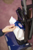 Riccar Tandem Air Deluxe Upright Vacuum - R30D.8 – dust bag being removed from open compartment