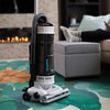 Simplicity Pet Bagless Upright Vacuum – 15314 – upright vacuum standing beside a sofa