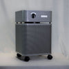 Austin Air Immunity Air Purifier Standard (Graphite) #B444D1 – graphite air purifier beside curtain