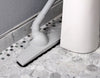 Axis Hard Floor Brush cleaning a difficult-to-reach floor area
