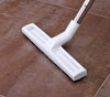 14-Inch Deluxe Hard Floor Brush with Wheels cleaning multiple floor surfaces