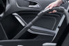 Miele SFD 10 long crevice nozzle cleaning a car door storage pocket