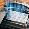 Miele HEPA AirClean filter installed in a canister vacuum, with an airflow illustration
