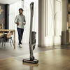 Miele Triflex HX2 Pro Cordless Vacuum (Infinity Grey PF) - 11827020 – person using cordless vacuum in room