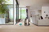 Miele TU HyClean Air 4 Vacuum Bags 12774420, canister vacuum in a living room with box