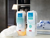 Miele UltraPhase 2 Sensitive 2-Component Detergent #11716960 – UltraPhase 1 and 2 Sensitive bottles beside laundry