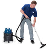 Powr-Flite 5 Gallon Wet-Dry Vacuum – Model #PF51 – operator using the canister vacuum and floor tool