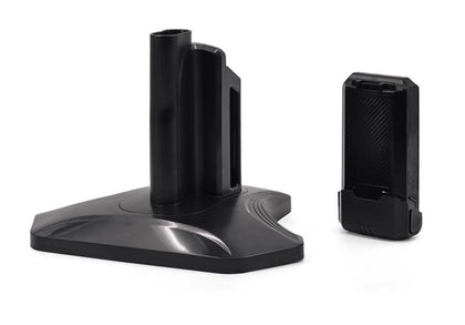 Dual charging base beside a cylindrical battery, reference R65DUAL. Available at Ace Vacuums.