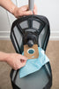 Riccar R10E SupraLite Entry vacuum with its bag compartment open during a bag change. Available at AceVacuums.