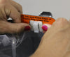 Canister clip under the VacuMaid P110 motor head