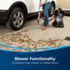 Bissell MultiClean Wet and Dry Auto Vacuum – 2035M – blower clearing leaves from garage