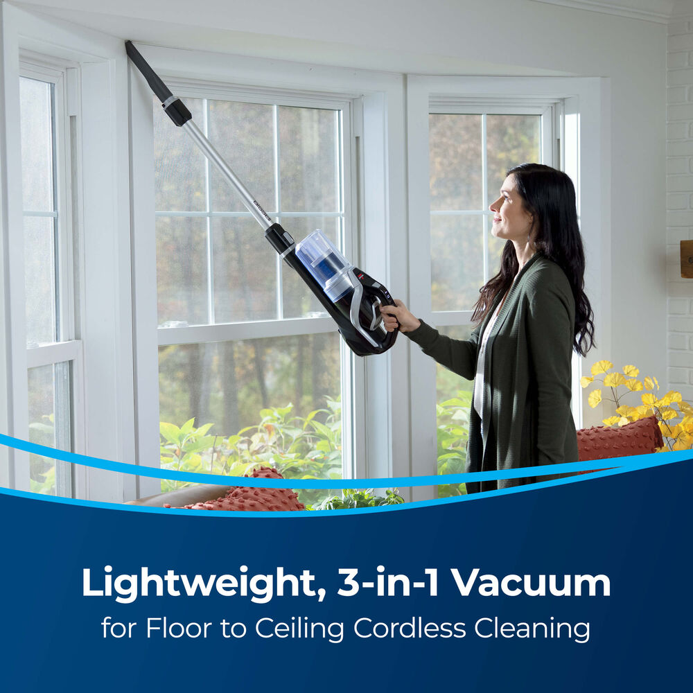 Bissell PowerEdge® Cordless Stick Vacuum - 2900A – extended wand cleaning above floor