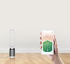 Dyson Pure Cool Purifying Tower Fan - TP04 – tower fan beside smartphone air-quality display