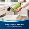 Bissell AirRam Cordless Vacuum – 1984 – dust bin being emptied