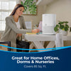 Bissell MYAir Personal Air Purifier #2780A – purifier beside a home-office desk
