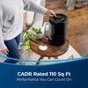 Bissell MYair Pro Air Purifier - Black #3139B – hand adjusting purifier with room-coverage graphic