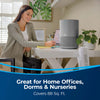Bissell MYAir Personal Air Purifier Grey #3329 – purifier beside a home-office desk