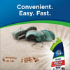 Bissell Woolite INSTAclean Pet Stain Remover #1740 – stain-remover bottle beside muddy shoes