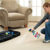 Bissell Woolite INSTAclean Pet Stain Remover 32 oz #1864 – person spraying a carpet stain beside chair