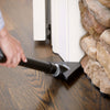 Bissell PowerGroom Swivel Pet Vacuum Cleaner – 22528 – hand tool cleaning beside fireplace