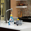 Bissell SpotBot Spot and Stain Portable Carpet Cleaner #2117 – cleaning solution and tank at sink