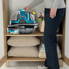 Bissell SpotBot Spot and Stain Portable Carpet Cleaner #2117 – cleaner stored in cabinet