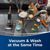 Bissell CrossWave X7 Cordless Pet Pro Multi-Surface Wet Dry Vac Exclusive Bundle #3277 – floor cleaner treating food spill near family