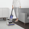 Dyson Ball Animal 2 Total Clean Vacuum Cleaner – upright vacuum cleaning carpet beside a sofa