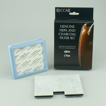 Pleated filter and shaped pad beside Riccar filter packaging, reference RF17. Available at Ace Vacuums.