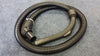 Riccar Sunburst Hose Assembly Replacement for Canister Vacuums – coiled hose with curved handle and connector, overhead view